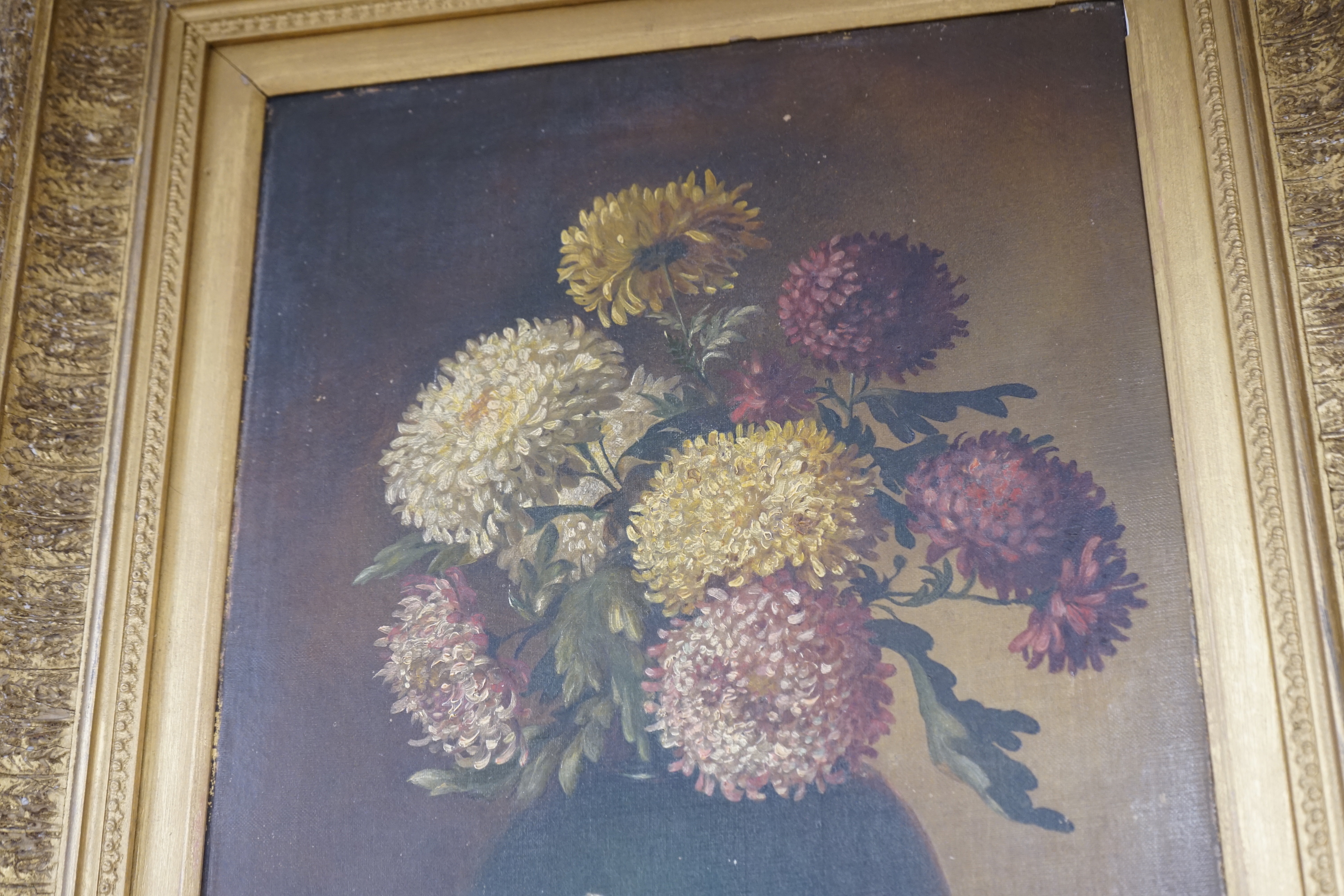 19th century oil on canvas, Still life of chrysanthemums in a vase, signed with monogram M.L, dated 1882, 45 x 35cm, ornate gilt framed